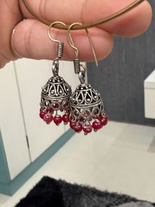 Silver Jhumka Earrings with Red Beads
