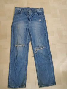 Ripped Light Wash Denim Jeans