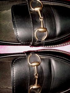 Black Loafers with Gold Detail