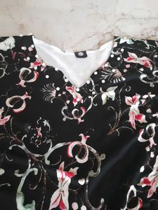 Peplum Top With  Pearl around The Neck