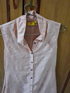 Sleeveless button up shirt