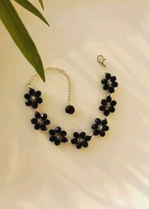 Two Bracelets And One Earrings