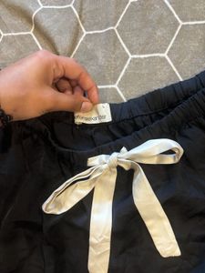 black satin shorts
