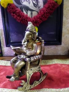 Ganesh Sitting On A Rocking Chair Idol