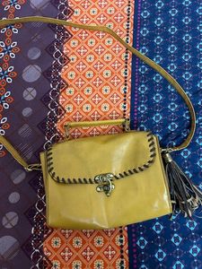 at half rate now mustard hand bag