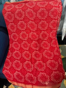 Red synthetic saree with blouse