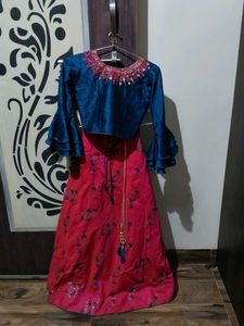 a blue and Rani colour choli lehenga with odni