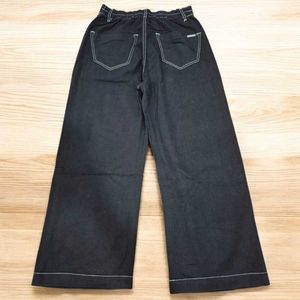 Black Wide-Leg Artistic Face Print Pants