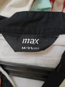 Elegant White Top with Black Trim