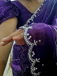 Elegant Purple Saree with Embellishments