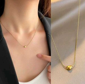 Gold Bow &amp; Heart Necklace