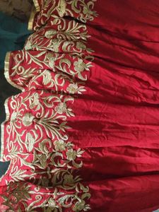 a good conditioned red embroidered gown or frock s