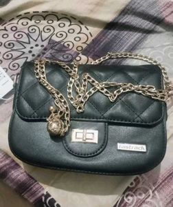 black solid sling bag