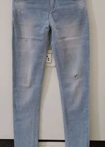 Light Wash Distressed Skinny Jeans