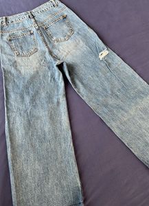 Distressed Wide Leg Denim Jeans