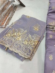 Embroidered dress material