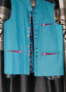 Teal Vest with Pink Accents