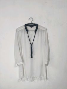 Chic White Blouse with Black Trim