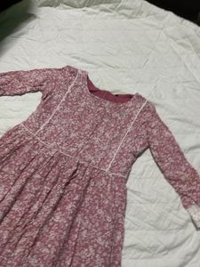 a pink and white flower printed dress