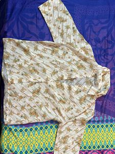Floral Shirt And Brown Trousers
