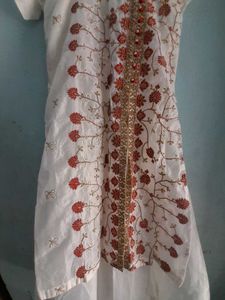 Beautiful White Coloured Gown. Festive Type.