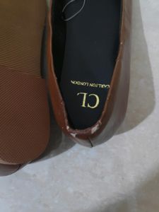A Pair Of Cute Pointed Carlton London Bellies
