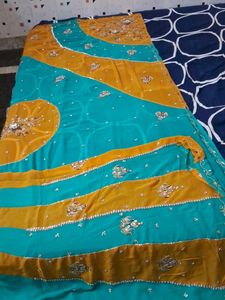 It Is Multi Color Chiffon Kundan Work Saree