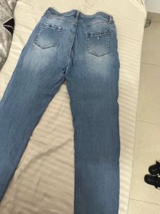 Ripped Knee Light Wash Jeans