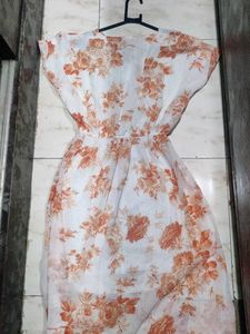 It&#39;s a frock orange White Colour