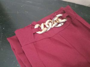 Maroon Wide-Leg Pants with Gold Chain Accent