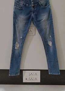 Ripped High-Waisted Jeans
