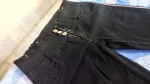 black skinny low waisted jeans with side stripes