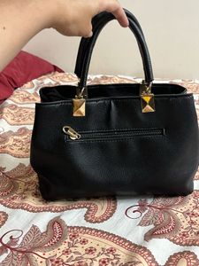 Danbaoly Black Faux Leather Handbag