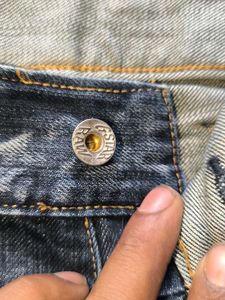 Distressed Denim Jeans