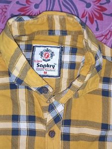 A Yellow Colour Black Checked Shirt. With Sapkry Brand. With M Sized