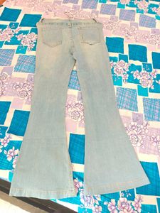 Ripped Bell Bottom Jeans
