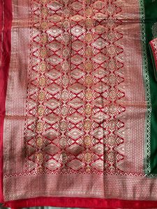 Green Banarasi Saree with Red Blouse