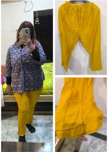 Mustard yellow churidar pant.
