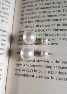 pearl stud earrings.