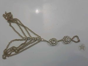 A Pair Of Dazzling Kundan style Stone Hathphool