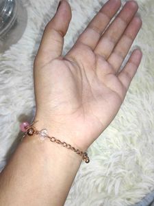 2 Bracelets With One Ring