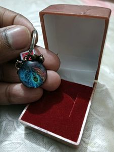 A Unique Keychain Type article Peacock Feather Des