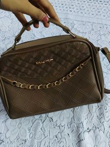 nude brown leather bag