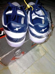Men Colourblocked Black And White Sneakers.