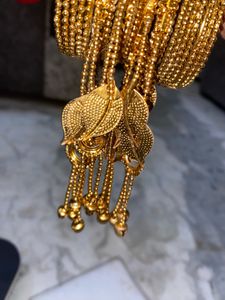 Thin Girl Golden Petal Jhumer Bangles