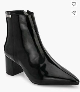 women black heeled Chelsea boots