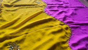 Stunning Yellow and Magenta Chiffon Saree
