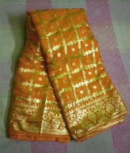 Elegant yellow Saree with Gold Details