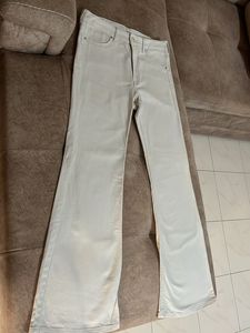 Cream bootcut Jeans