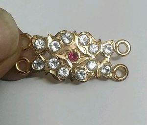Light Used Gold Covering Mogappu Dollar